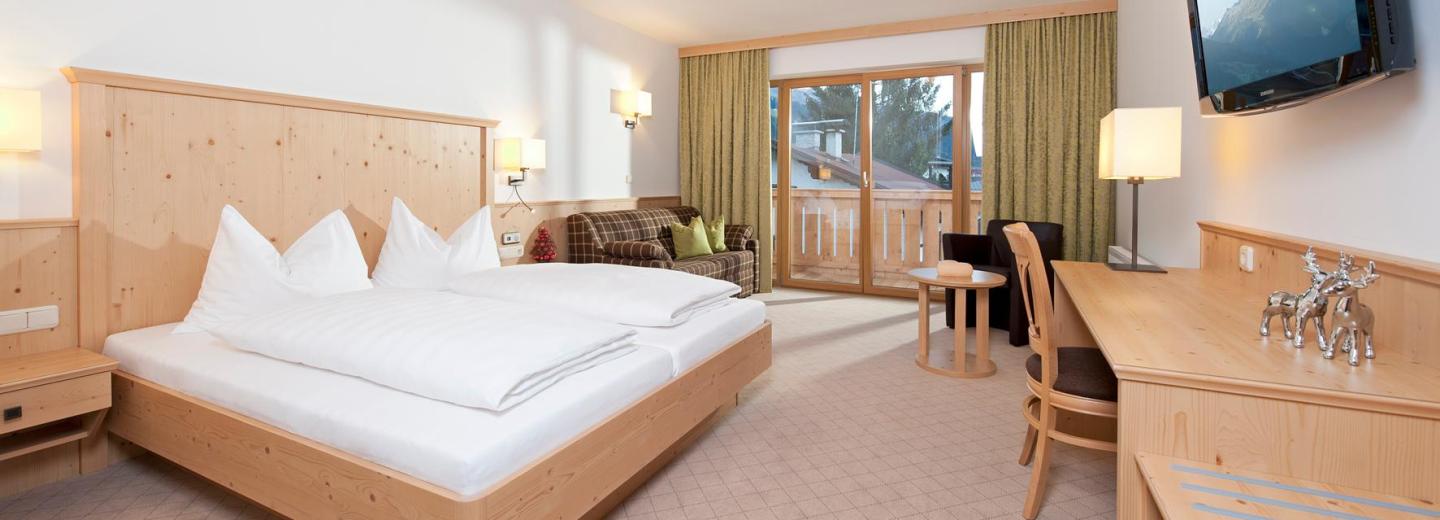 Zimmerbeispiel: Standard Vierbettzimmer Balkon (Haupthaus)