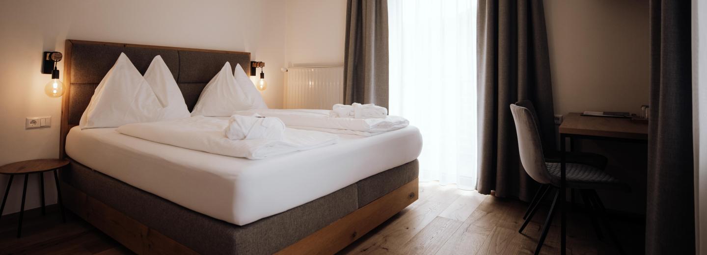 Zimmerbeispiel Doppelzimmer „WOHL.GEFÜHL“